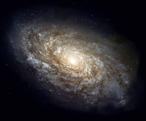  NASA     ГАЛАКТИКА С ФЛОКУЛЛЕНТНОЙ СПИРАЛЬНОЙ СТРУКТУРОЙ NGC 4414. Космический телескоп Хаббла